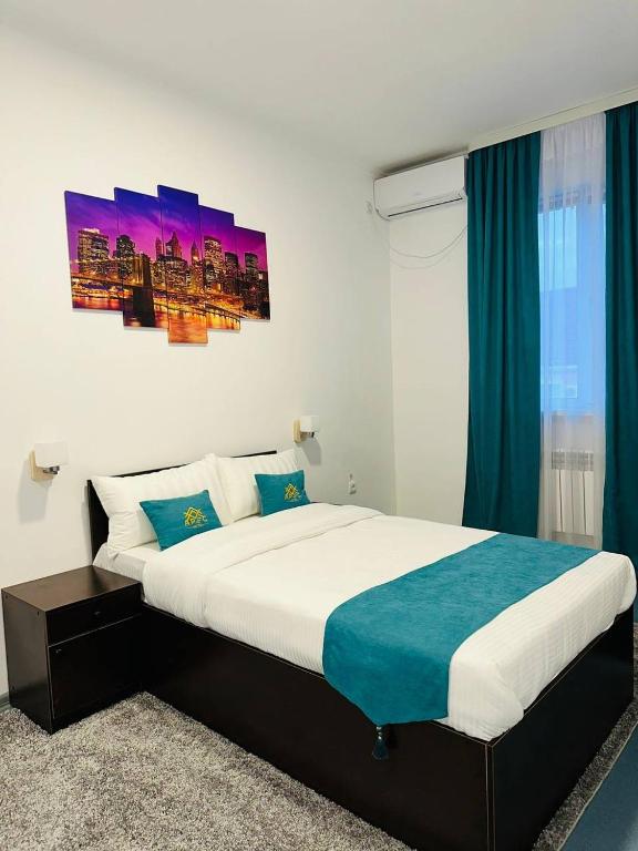 Postel nebo postele na pokoji v ubytování Apec Hotel