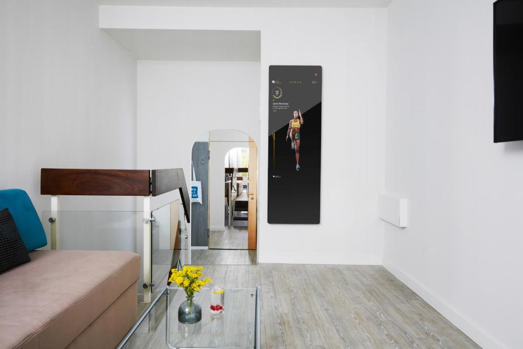 TV a/nebo společenská místnost v ubytování Living Hotel am Olympiapark