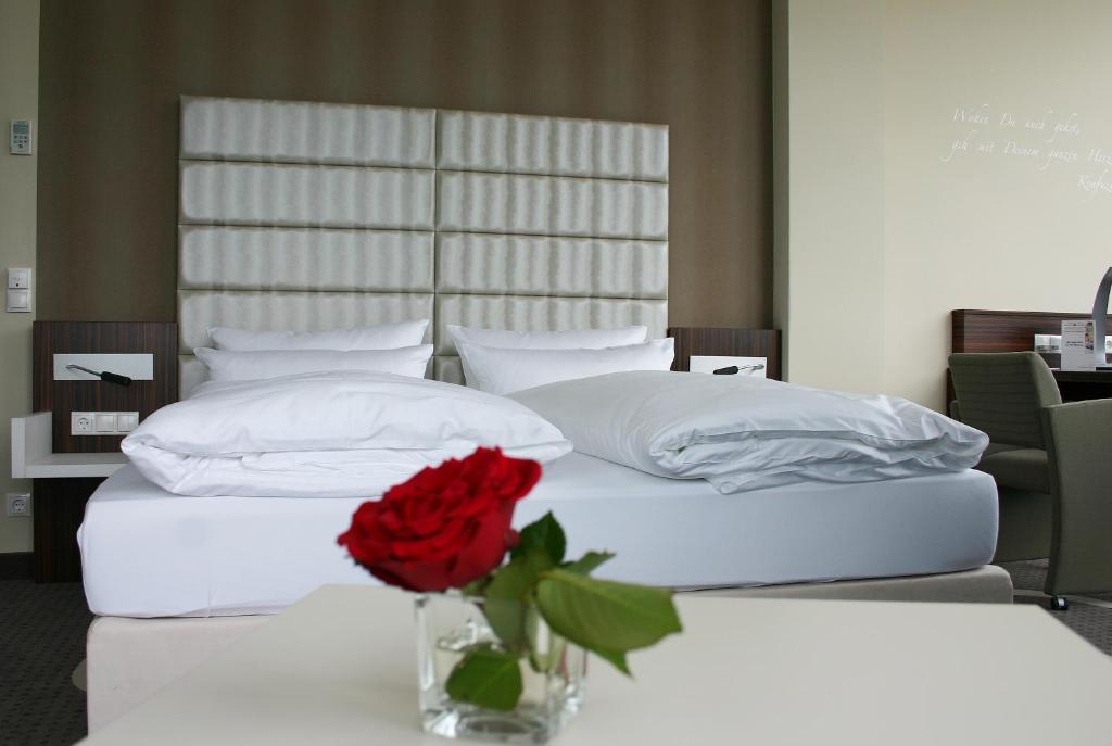 Postel nebo postele na pokoji v ubytování Business-Hotel Artes