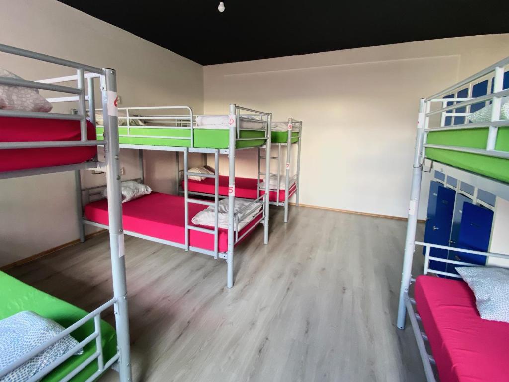 Postel nebo postele na pokoji v ubytování Urban Elephants Hostel