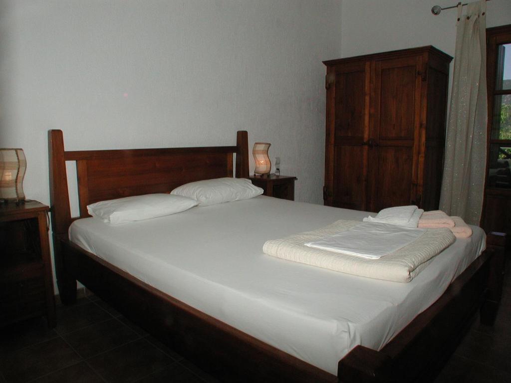 Postel nebo postele na pokoji v ubytování Sun Accommodation