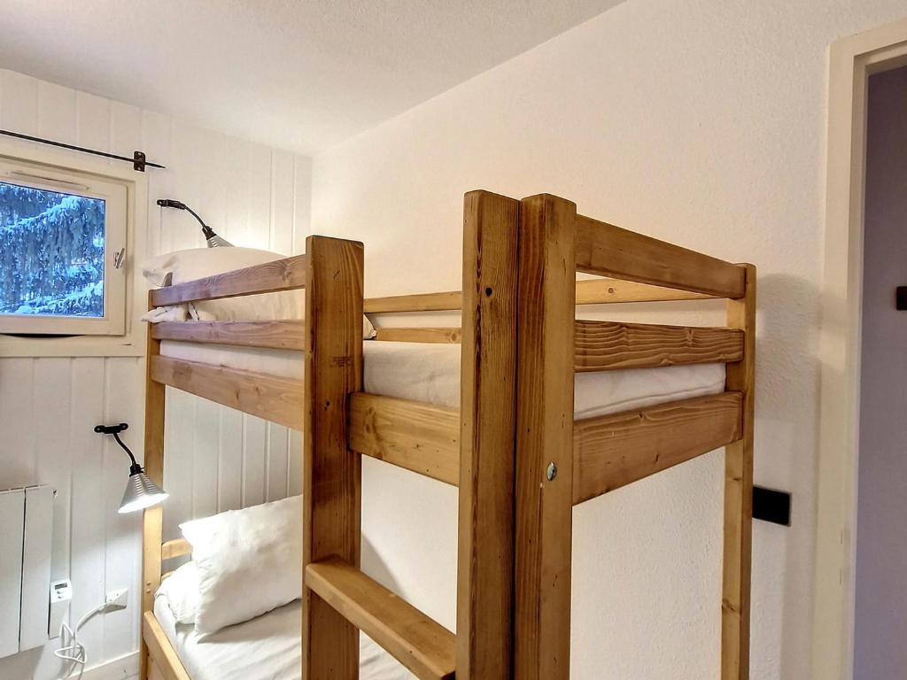 Posteľ alebo postele v izbe v ubytovaní Appartement confortable proche centre, pistes et parking couvert - FR-1-518-116
