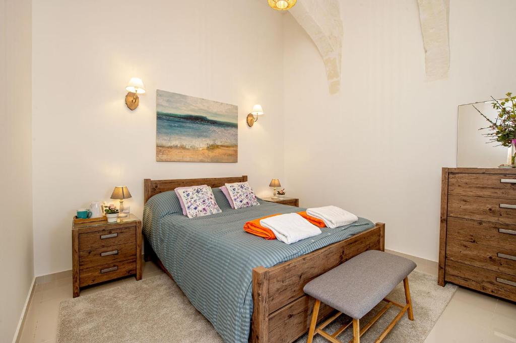 Postel nebo postele na pokoji v ubytování Dar It-Torri Holiday Home