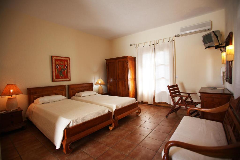 Postel nebo postele na pokoji v ubytování Sun Accommodation