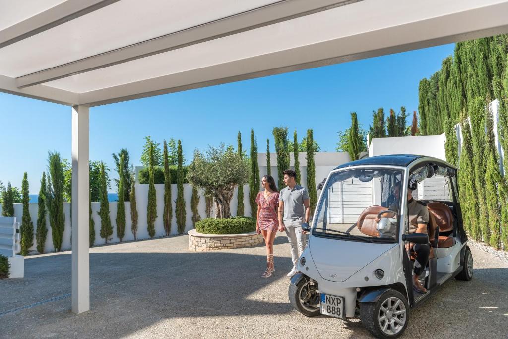 a rendering of a small golf cart under a pavilion at Cap St Georges Villas in Peyia