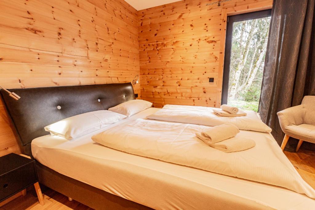 A bed or beds in a room at Chalet Dinkel in Niedernsill