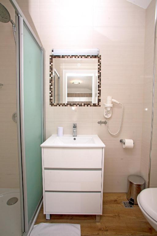 Łazienka w obiekcie Apartments Maslina III