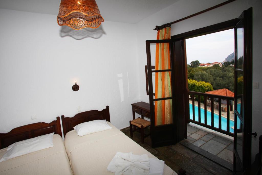 Postel nebo postele na pokoji v ubytování Sun Accommodation