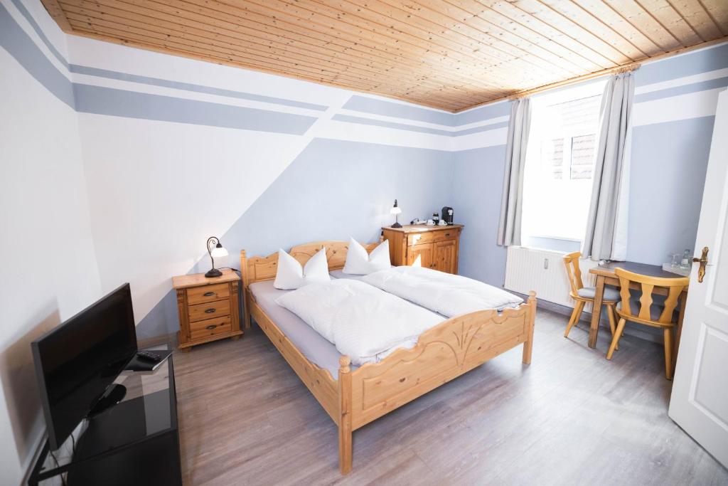 Postel nebo postele na pokoji v ubytování Pension Friedrichshof
