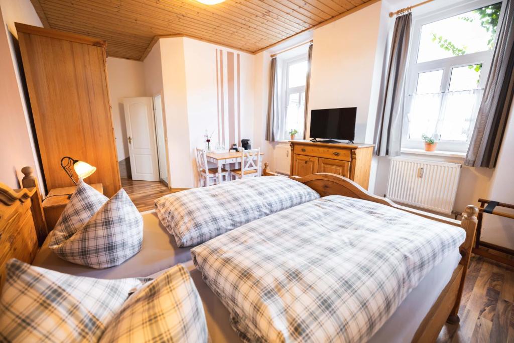 Postel nebo postele na pokoji v ubytování Pension Friedrichshof