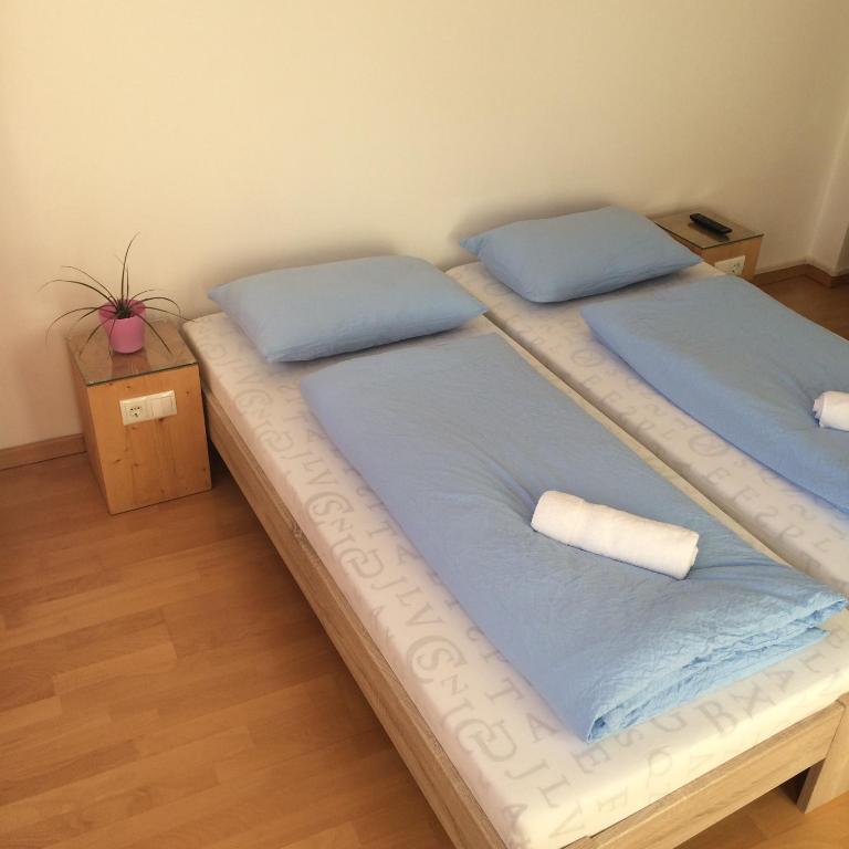 Łóżko lub łóżka w pokoju w obiekcie Argentieri Guesthouse