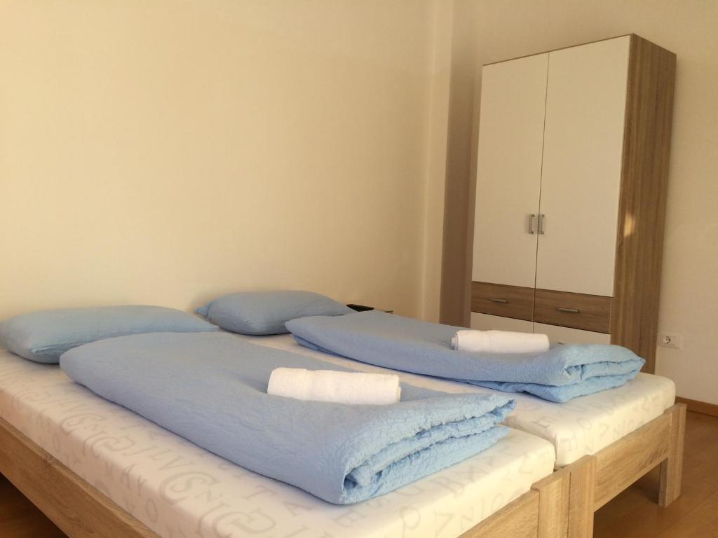 Łóżko lub łóżka w pokoju w obiekcie Argentieri Guesthouse