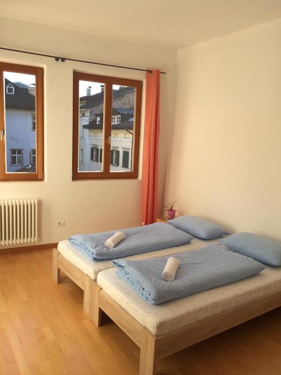 Łóżko lub łóżka w pokoju w obiekcie Argentieri Guesthouse