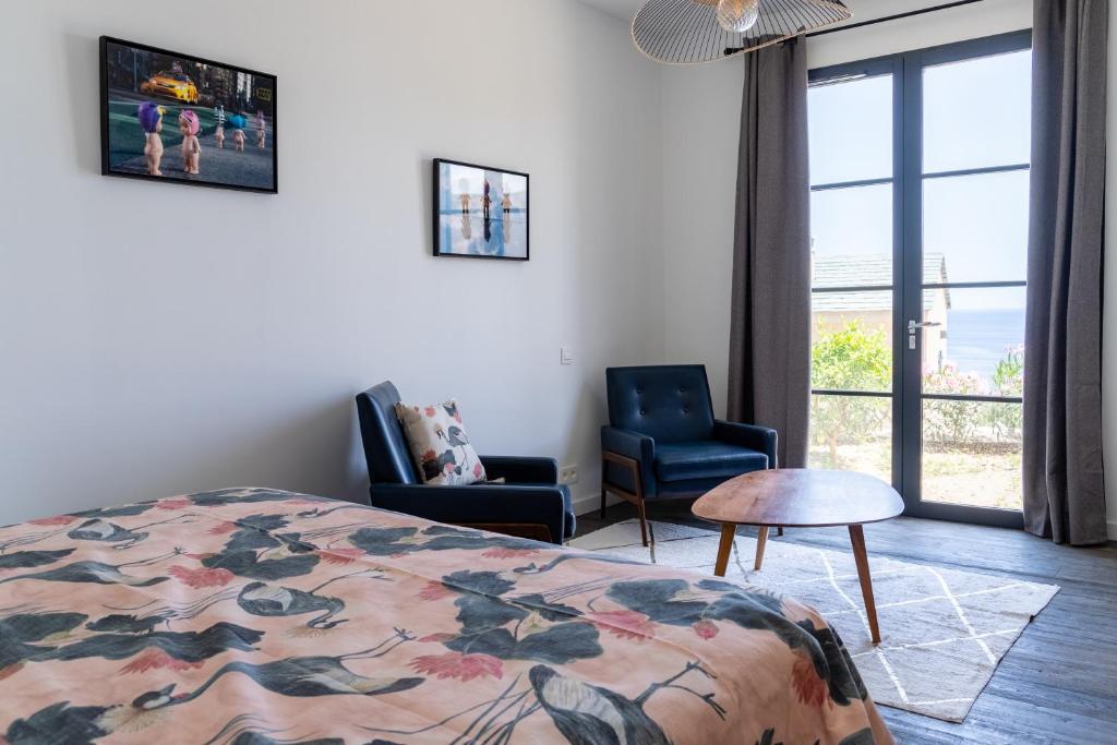 Giường trong phòng chung tại Casa lunga, 8 pax, clim, vue mer, piscine