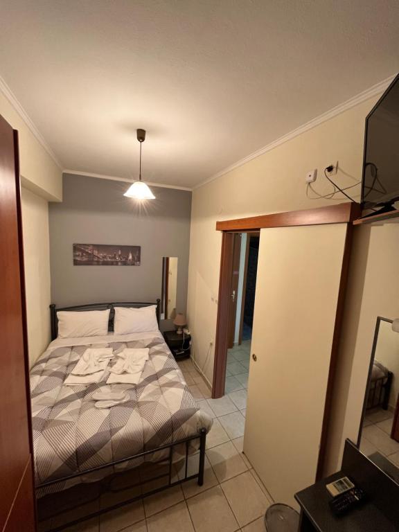 Postel nebo postele na pokoji v ubytování Pinpoint Rooms