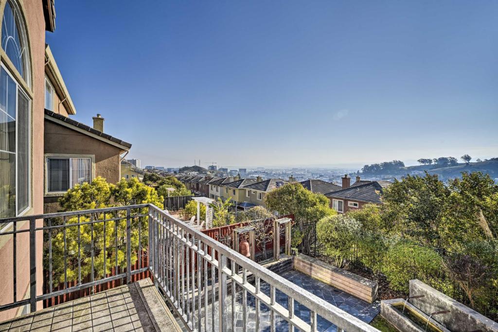 a balcony with a view of a city at San Francisco Getaway with Luxury Amenities! in South San Francisco