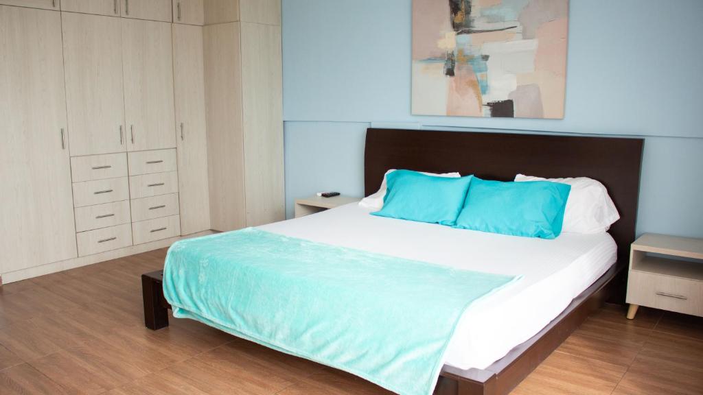 Postel nebo postele na pokoji v ubytování Hotel Brisas De Calima