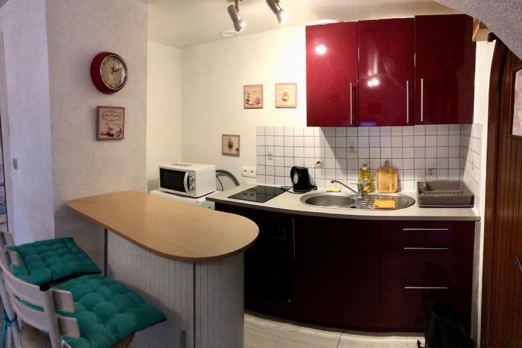 Kuchyňa alebo kuchynka v ubytovaní Appart T1 Préfecture et Centre