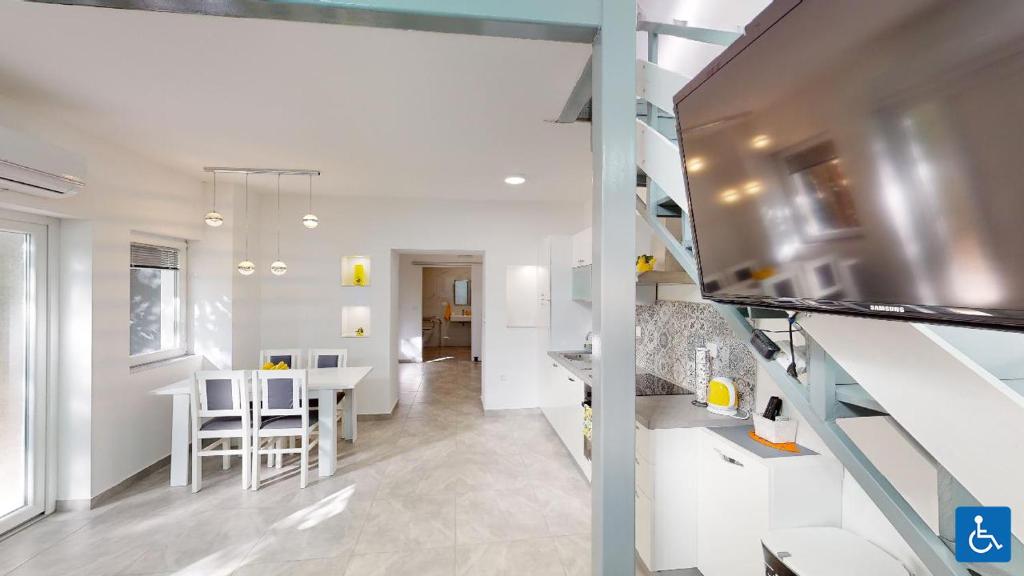 Kuchyň nebo kuchyňský kout v ubytování Apartments Mare