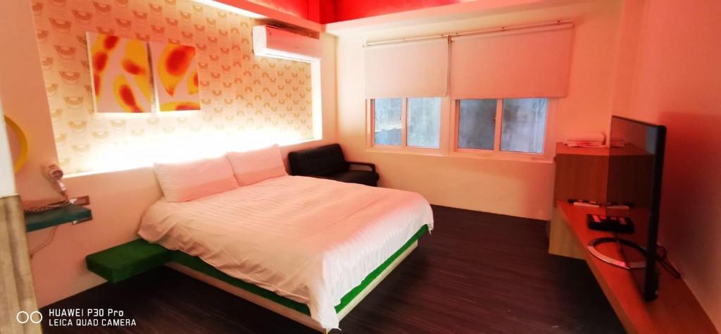 Postel nebo postele na pokoji v ubytování Nandu Inn