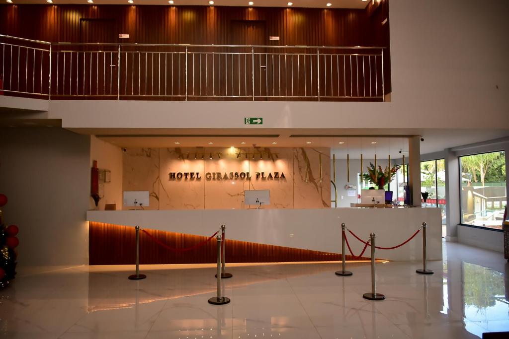 a lobby of a building with a exhibit in it at Hotel Girassol Plaza in Palmas