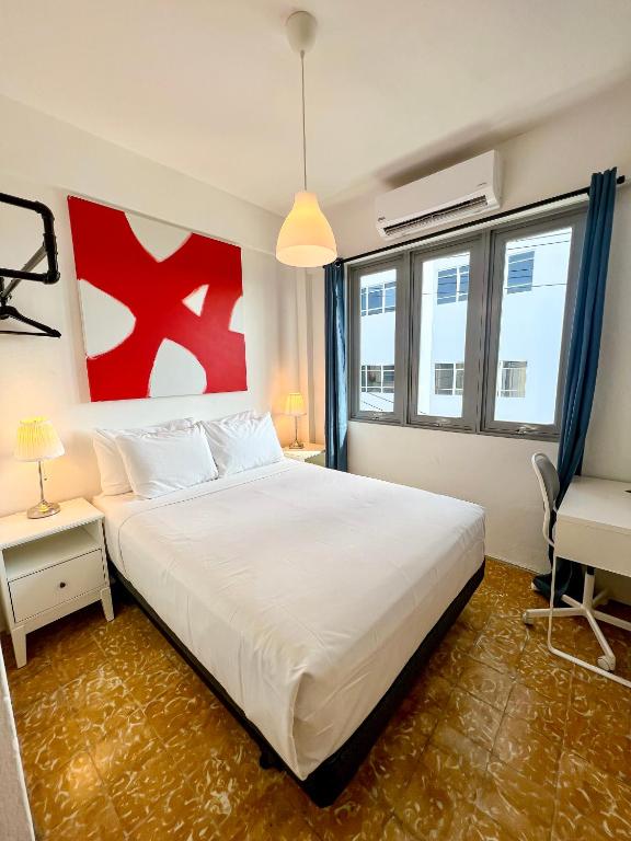 Postel nebo postele na pokoji v ubytování Urbana Hotel