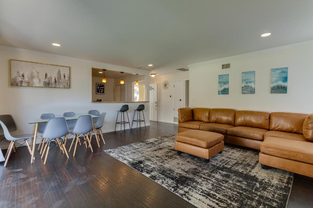a living room with a couch and a table and chairs at 5 Bedroom Charmer in Granada Hills in Granada Hills