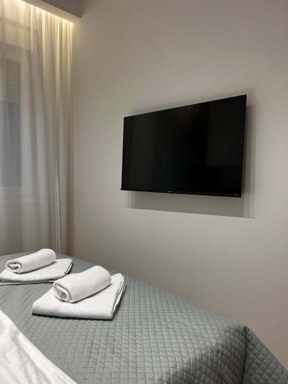 Postel nebo postele na pokoji v ubytování Real Apartment Banovci