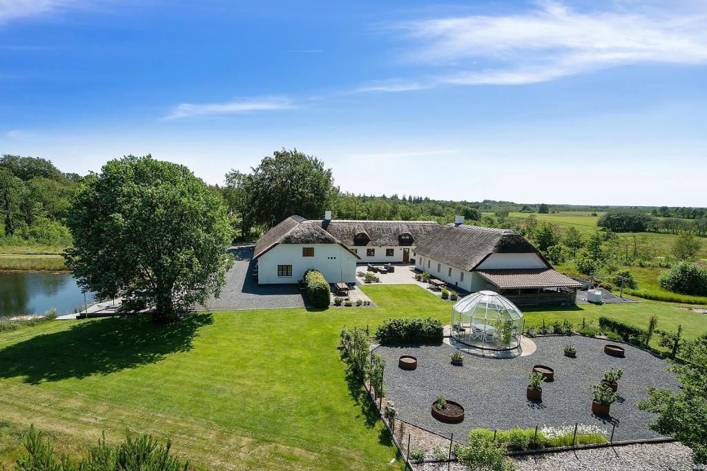 an aerial view of a house with a garden at Schellerup Gård in Herning