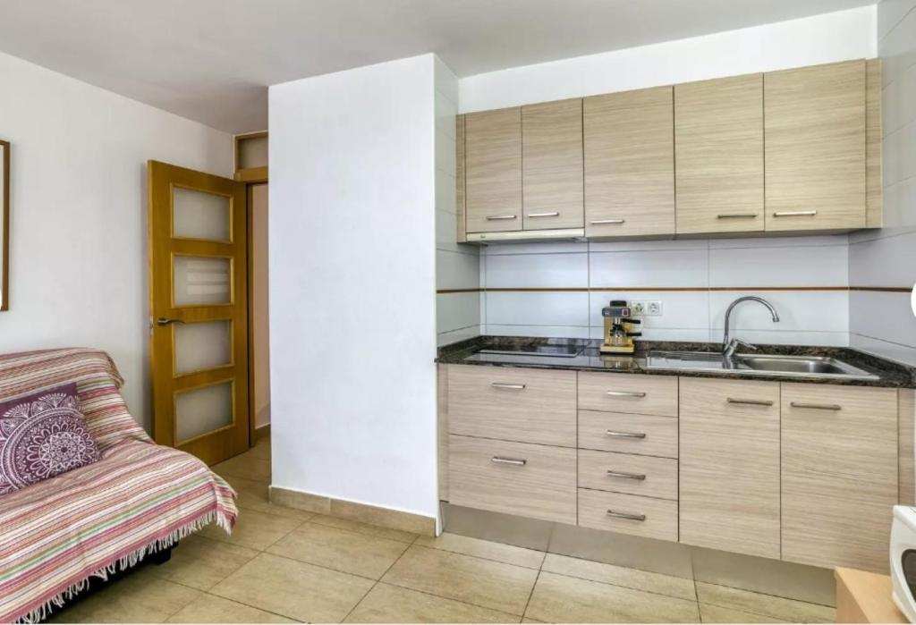Kuchyň nebo kuchyňský kout v ubytování Apartamento vistas panorámicas