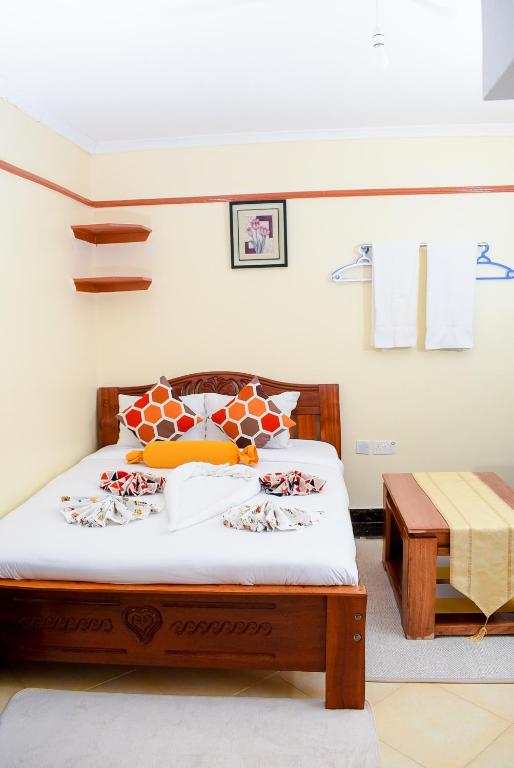 Postel nebo postele na pokoji v ubytování Nelly fully furnished studios