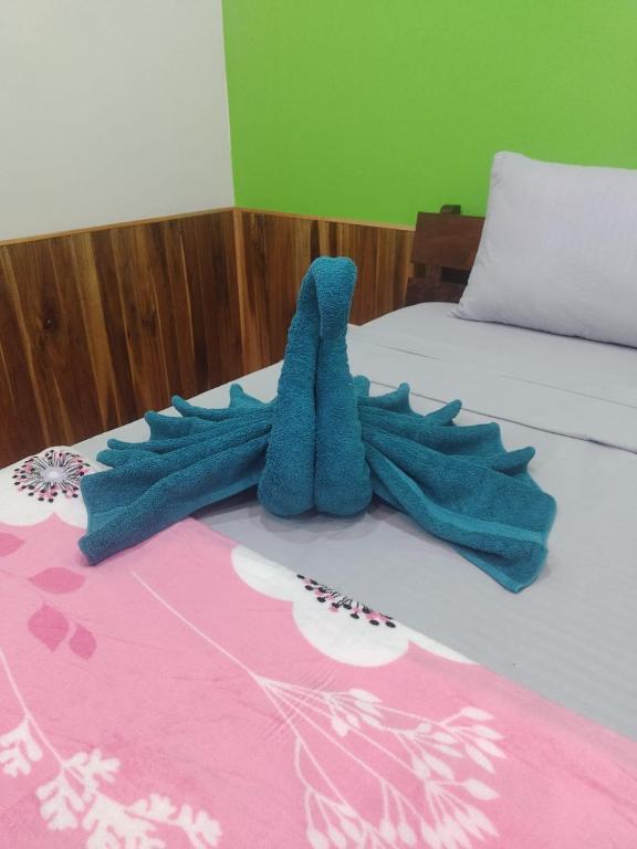 Postel nebo postele na pokoji v ubytování Pochote Lodge