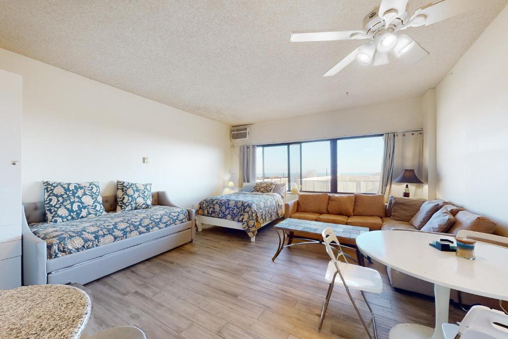 a living room with a couch and a table at Highpoint North M1 in Ocean City