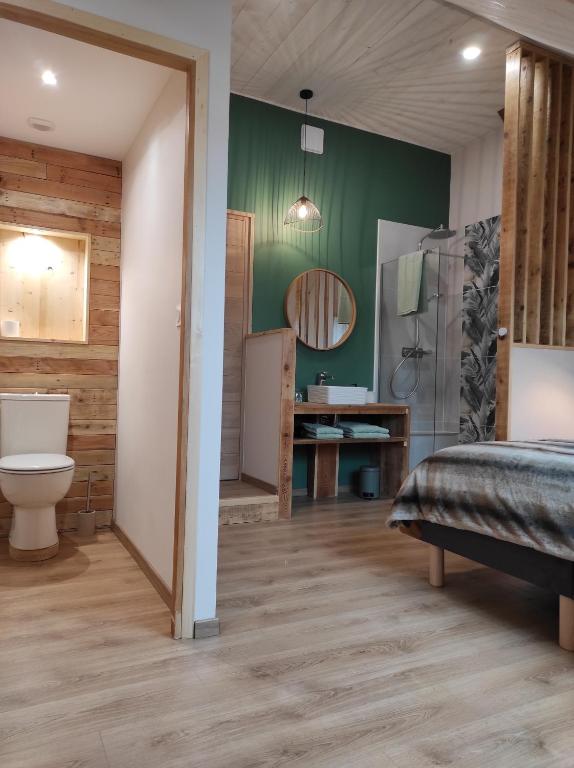 Koupelna v ubytování Le Grenier - Chambre d'hôtes