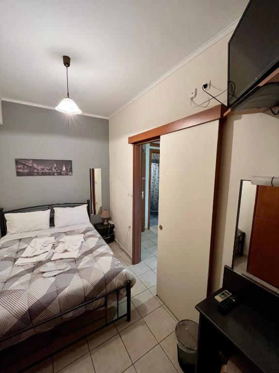 Postel nebo postele na pokoji v ubytování Pinpoint Rooms