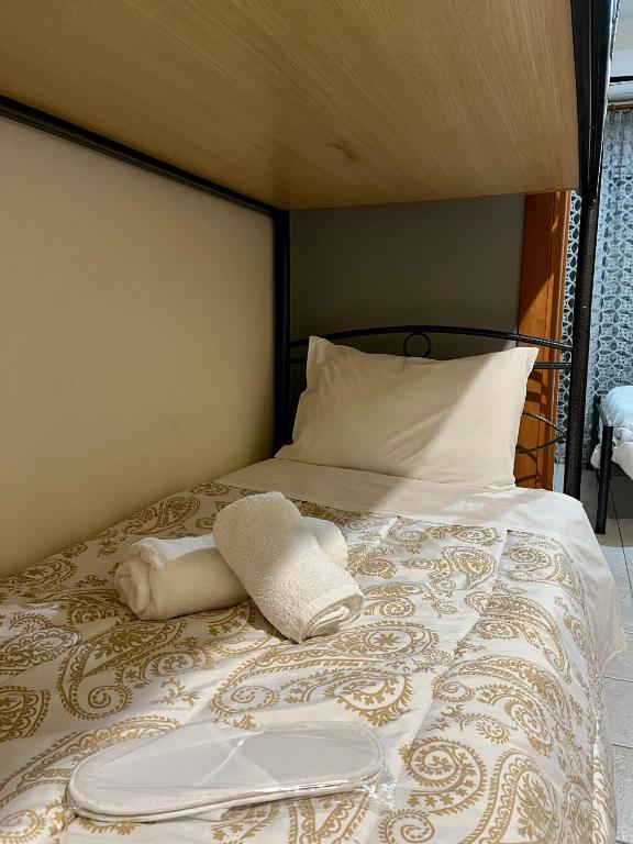 Postel nebo postele na pokoji v ubytování Pinpoint Rooms