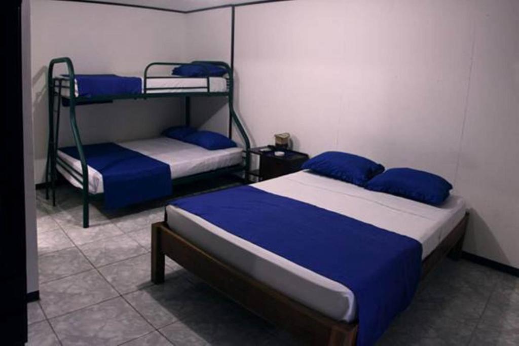 Postel nebo postele na pokoji v ubytování Cabinas Smith