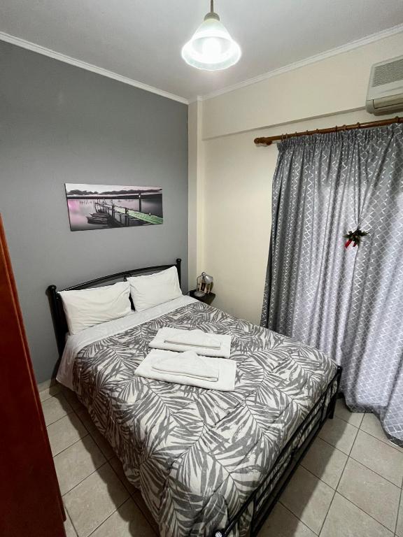 Postel nebo postele na pokoji v ubytování Pinpoint Rooms