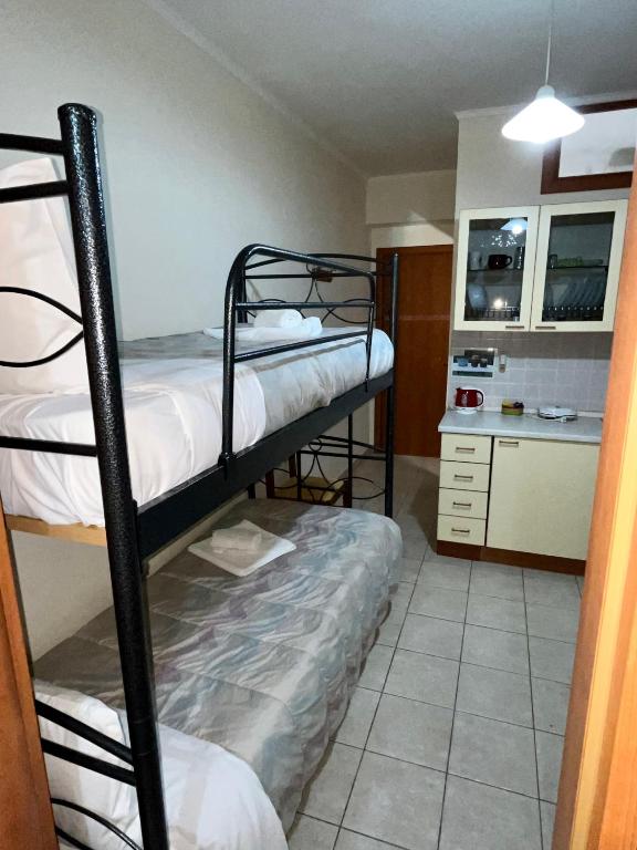 Postel nebo postele na pokoji v ubytování Pinpoint Rooms
