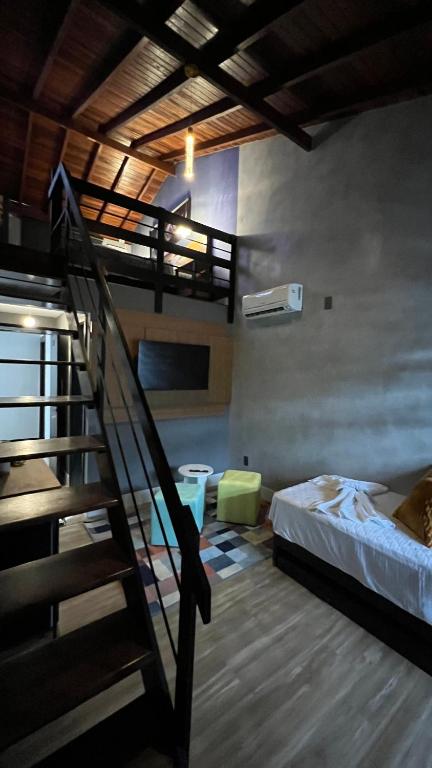 Cama ou camas em um quarto em Hotel La Serena