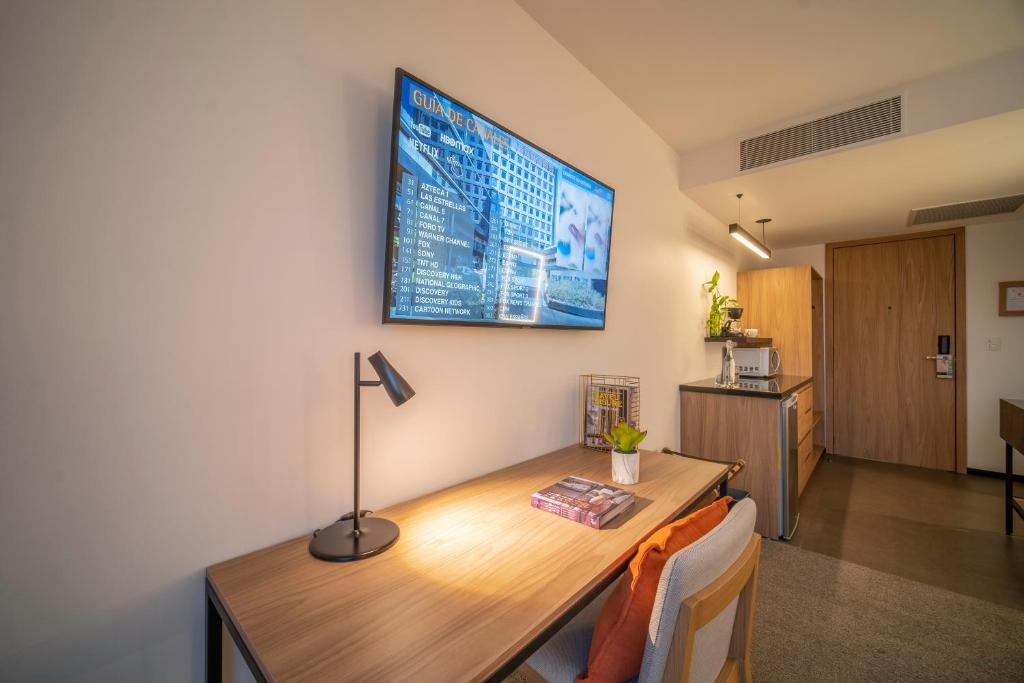 Kuchyň nebo kuchyňský kout v ubytování Stadía Suites Querétaro Centro Histórico