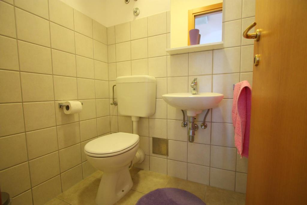 Kúpeľňa v ubytovaní Apartment Deluxe Sea View Split