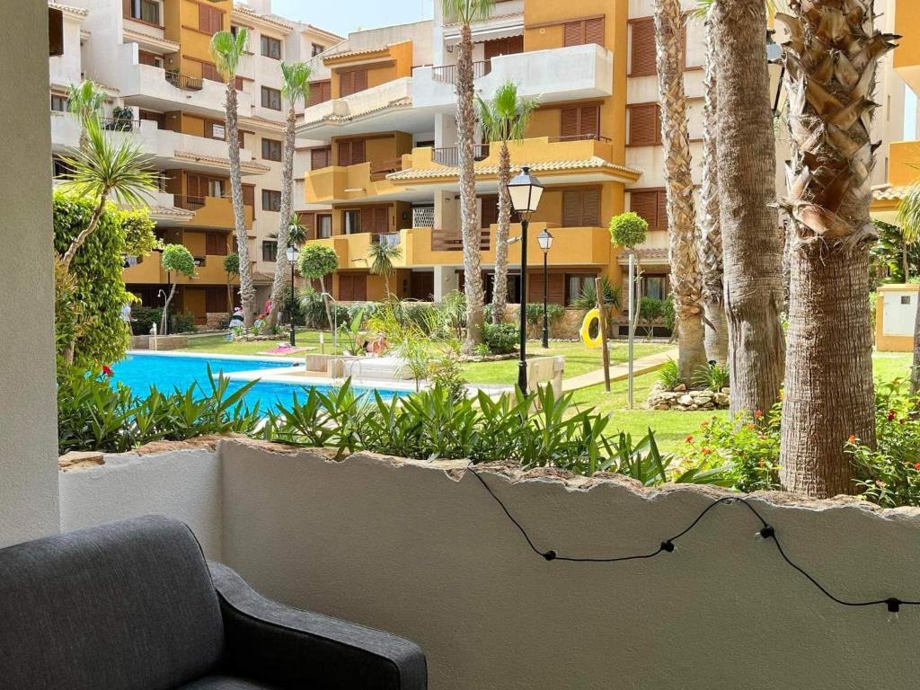 Fotografie z fotogalerie ubytování Turquesa Apartment,Punta Prima ,2 bed, 4 swimming pools and cabriolet Peugeot 307 included v destinaci Torrevieja