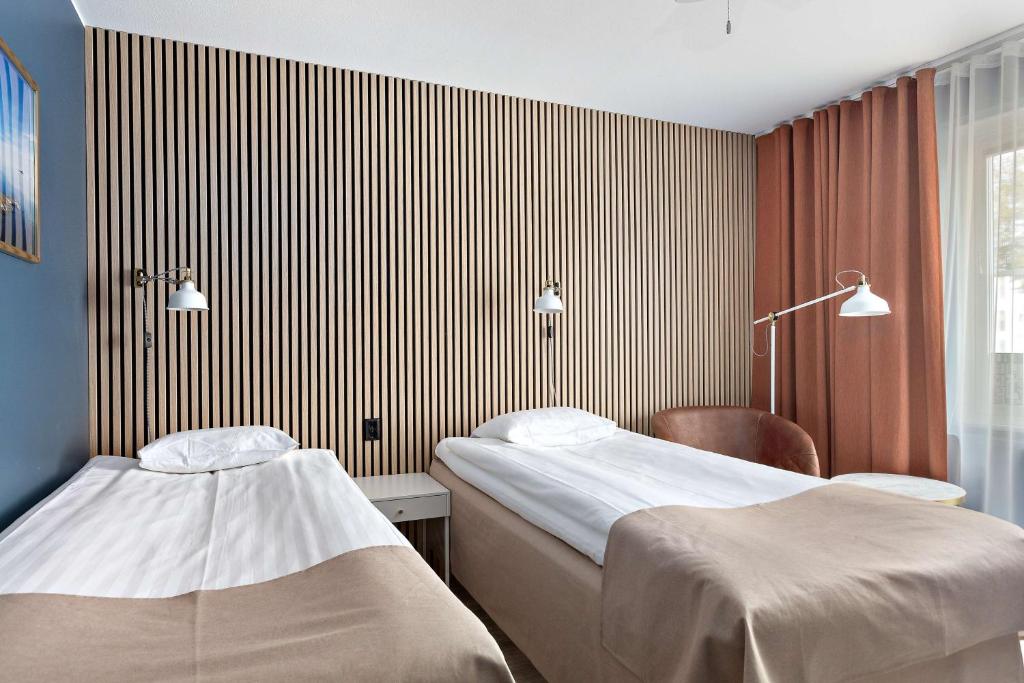 Postel nebo postele na pokoji v ubytování Best Western Centralhotellet