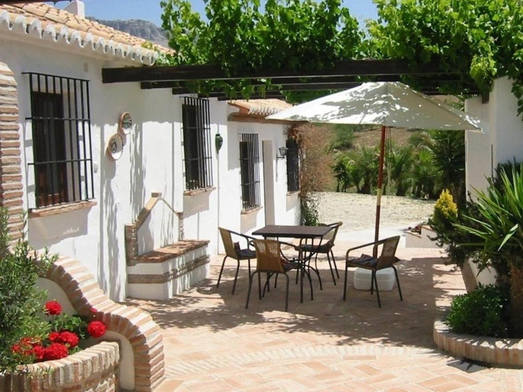Patio lub wspólna przestrzeń na świeżym powietrzu w obiekcie Holiday Home in Villanueva near El Torcal Park