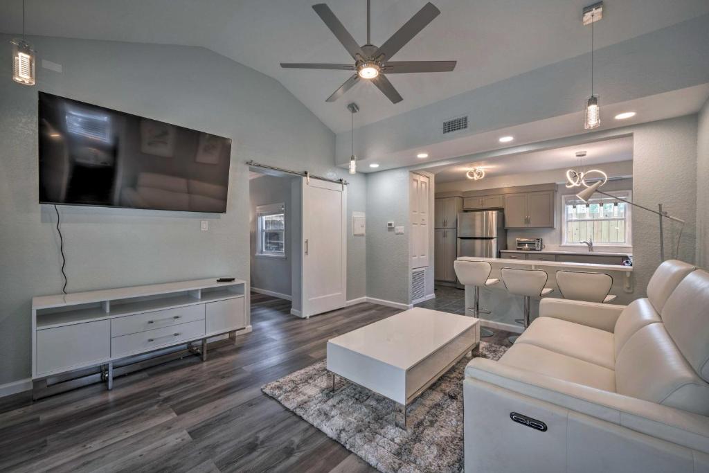 a living room with a couch and a tv at Apopka Getaway with Yard and Covered Patio in Apopka