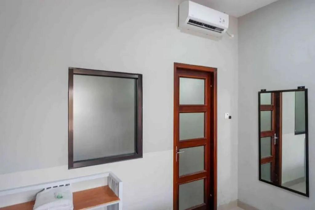 Reddoorz near Stadion Kridosono Blora - Chambre Lits Jumeaux