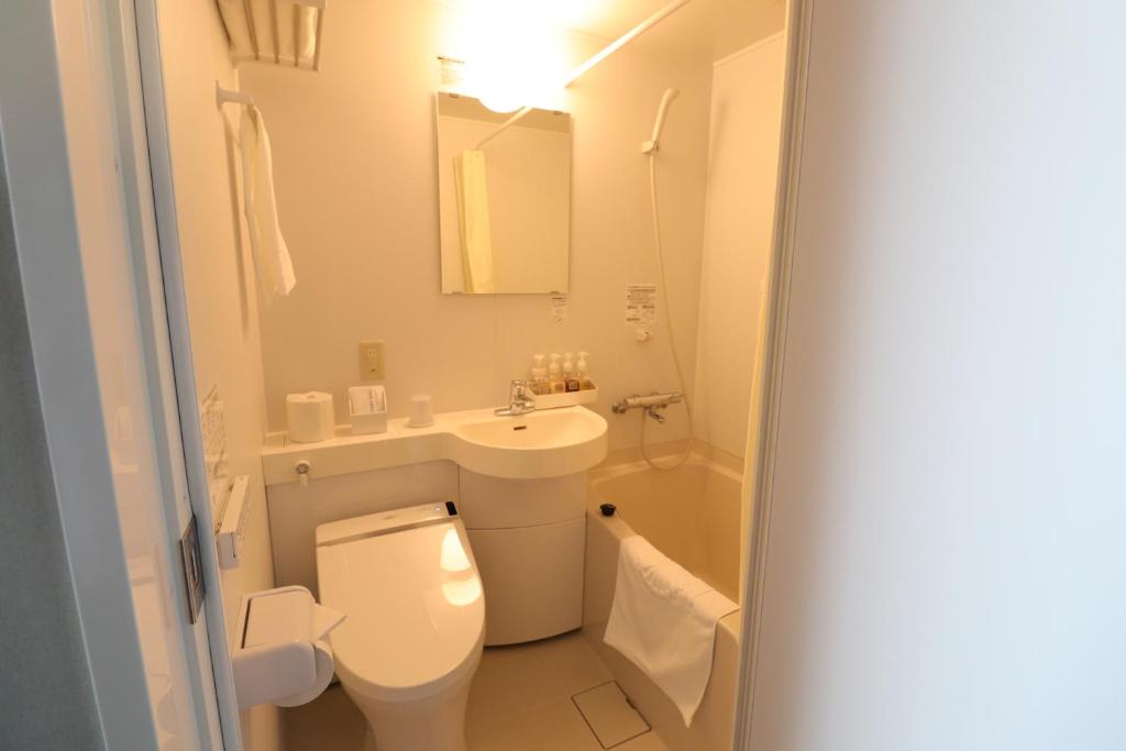Koupelna v ubytování Silk Hotel