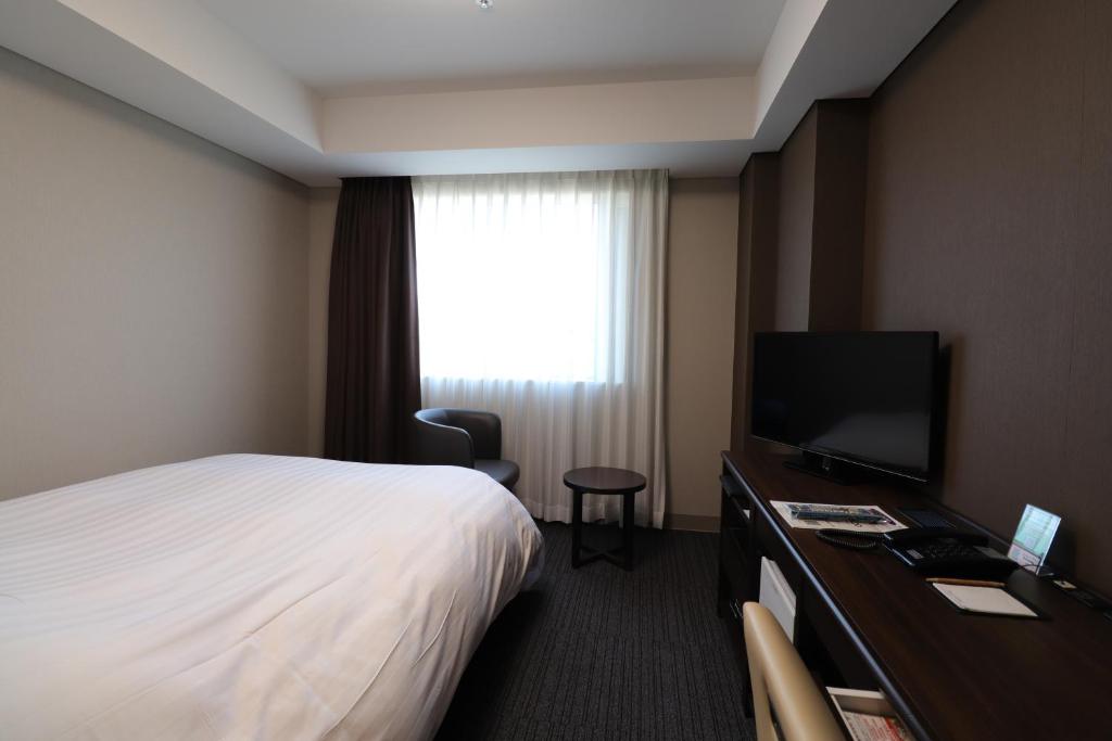TV a/nebo společenská místnost v ubytování Silk Hotel
