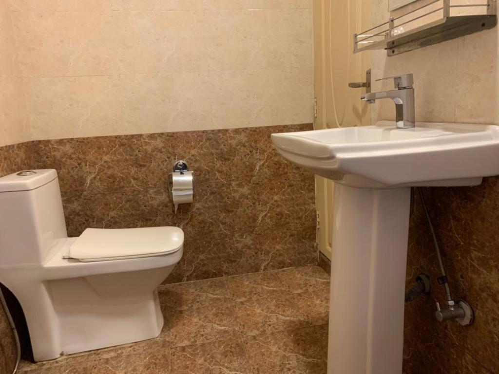 Koupelna v ubytování Hotel Ramanam